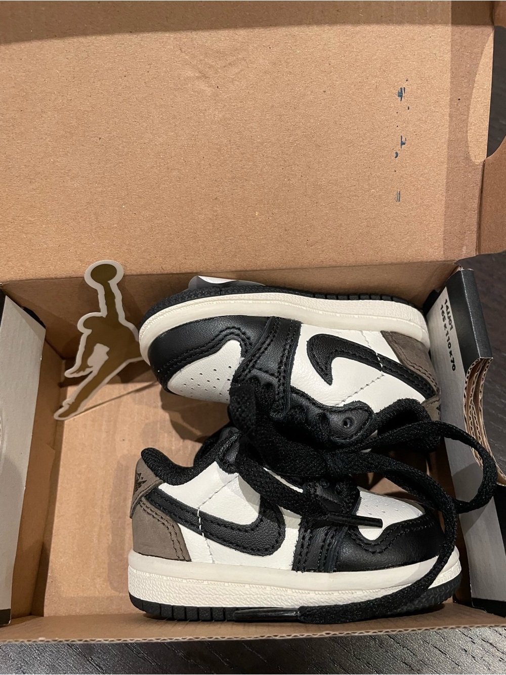 Nike Jordan Kids Sneakers in Black, White, and Gray 2c